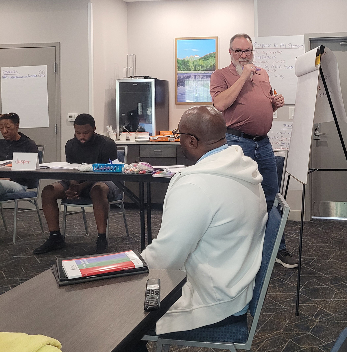 WRAP Facilitator leading a class discussion with participants.